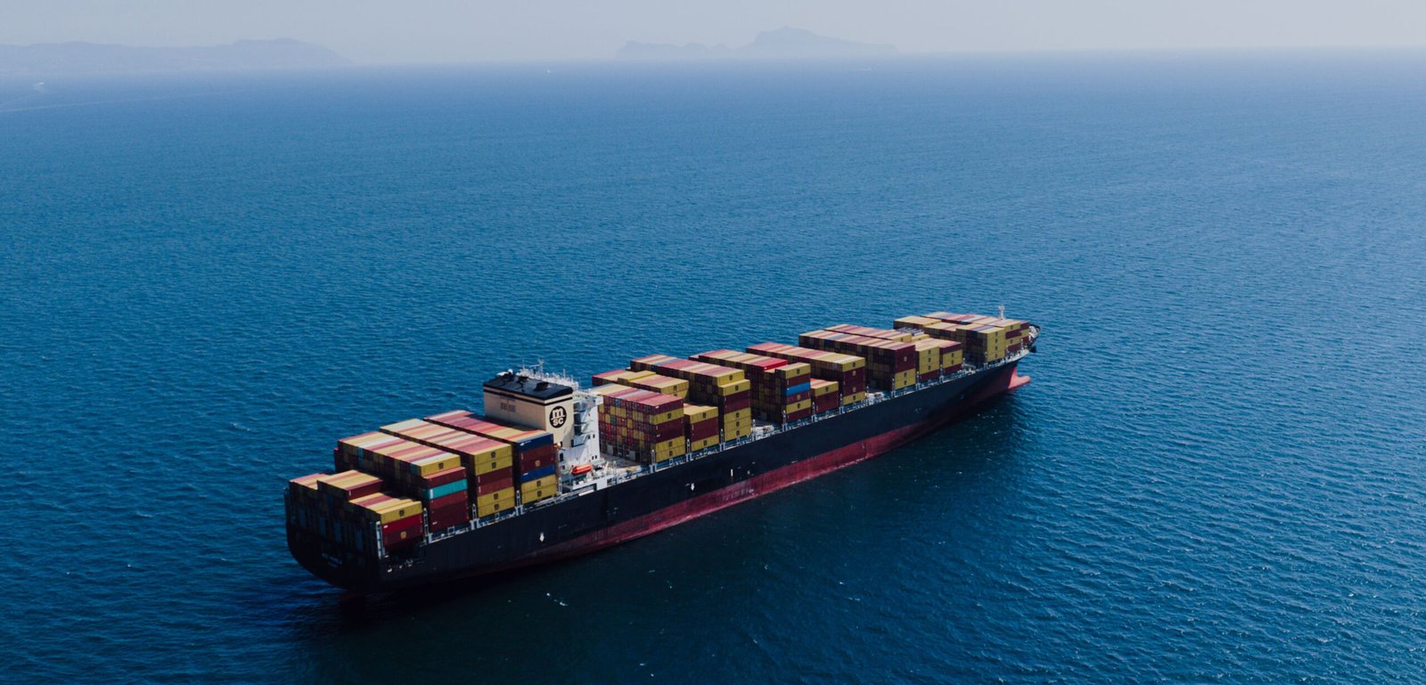 Ocean Freight Services by Blue Ocean Marine Logistics featuring container vessel transporting FCL, LCL, reefer, and break bulk cargo worldwide.